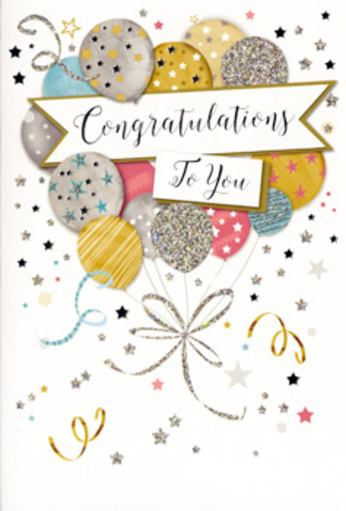 The photograph focuses on a beautifully designed congratulations card, its artwork evoking the same uplifting mood as a fresh bouquet delivered to a home near Emerson Park in Hornchurch. In the centre of the card, a carefully balanced arrangement of illustrated balloons forms a rounded, cloud-like cluster, as if they are drifting upwards together. Their colours are soft yet celebratory, blending champagne gold, lustrous silver, pale sky blue, blush pink, and gentle grey into a harmonious palette. Each balloon is embellished with tiny stars, neat bands of stripes, or subtle glittery speckles, giving the impression of delicate metallic ink that would catch the light on a mantelpiece. From the bottom of the cluster, fine balloon strings fall in sweeping arcs of gold and silver, intertwining in an ornate flourish that mirrors the elegant curls of ribbon we use to finish a gift bouquet in a local Hornchurch florist studio. The background remains mostly white or very light, sprinkled liberally with assorted stars, tiny dots, and playful ribbon coils that seem to swirl around the balloons, suggesting confetti fluttering through the air at a surprise party. Cutting across the centre is a tasteful banner, its edges softly curved, holding the message Congratulations To You in sophisticated calligraphy that balances clarity with decorative charm. The composition feels celebratory without being loud, carrying a quiet, polished joy that suits many life events - exam triumphs, job promotions, new ventures, or personal achievements. It is easy to imagine this card propped beside a vase of congratulatory flowers in a Hornchurch kitchen, the balloons and lettering silently echoing the pride and encouragement behind the sender's thoughtful gesture.